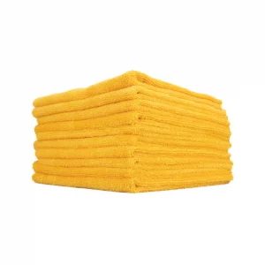 a stack of yellow towels