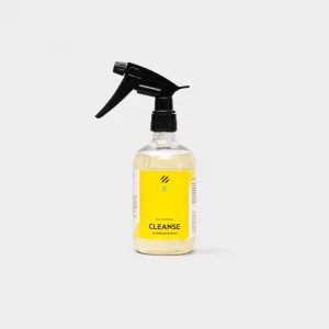 a spray bottle with yellow liquid